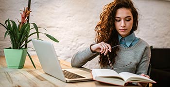 Female student reading an essay